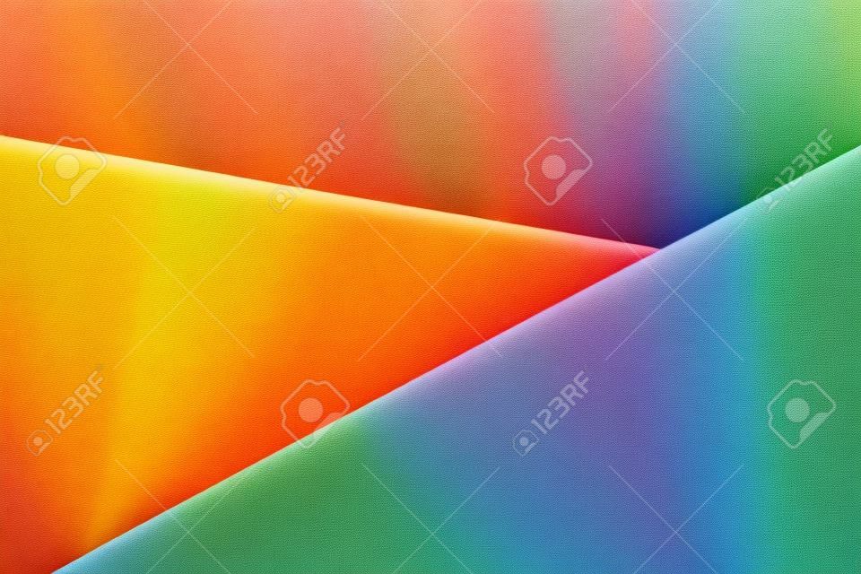Wielokolorowe tło z papieru w różnych kolorach, widok z góry