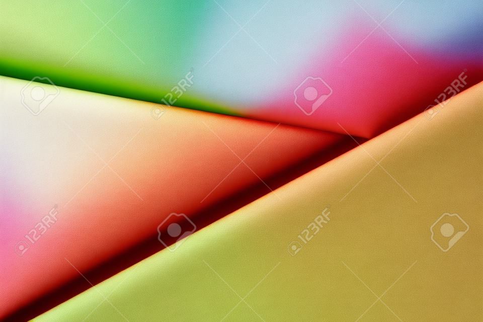 Fundo multicolorido de um papel de cores diferentes, vista superior