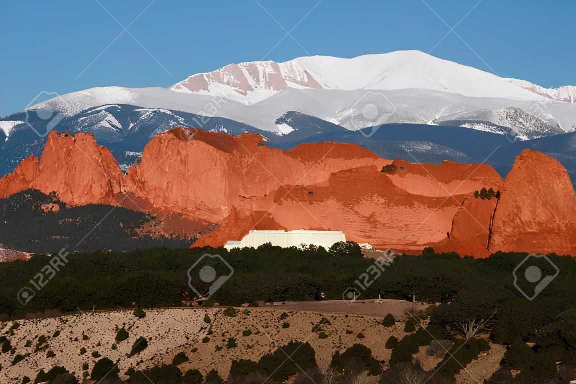 A beautiful image taken the morning after a May storm which left a cap of fresh snow on Pikes Peak and added texture to the Kissing Camels in Garden of the Gods Park, Colorado SPrings, Colorado