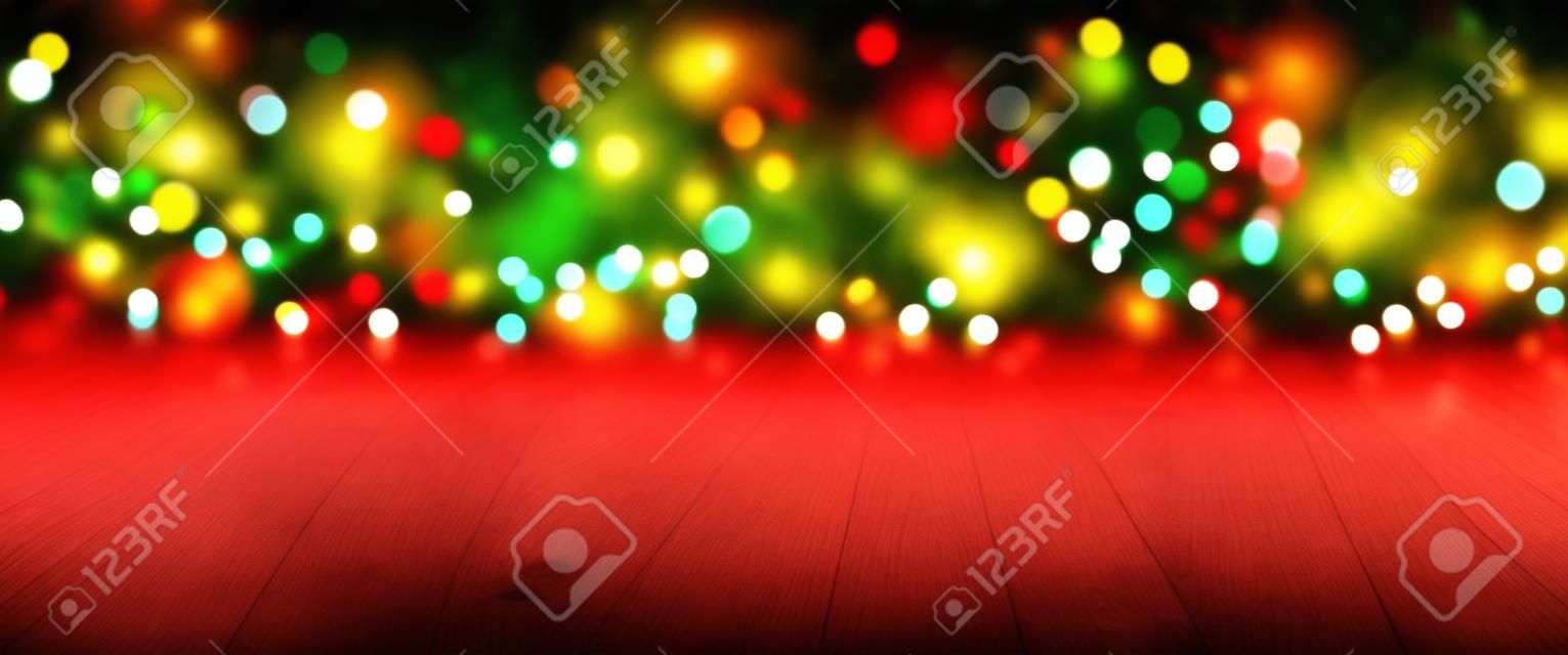Christmas Bokeh background with empty wooden table