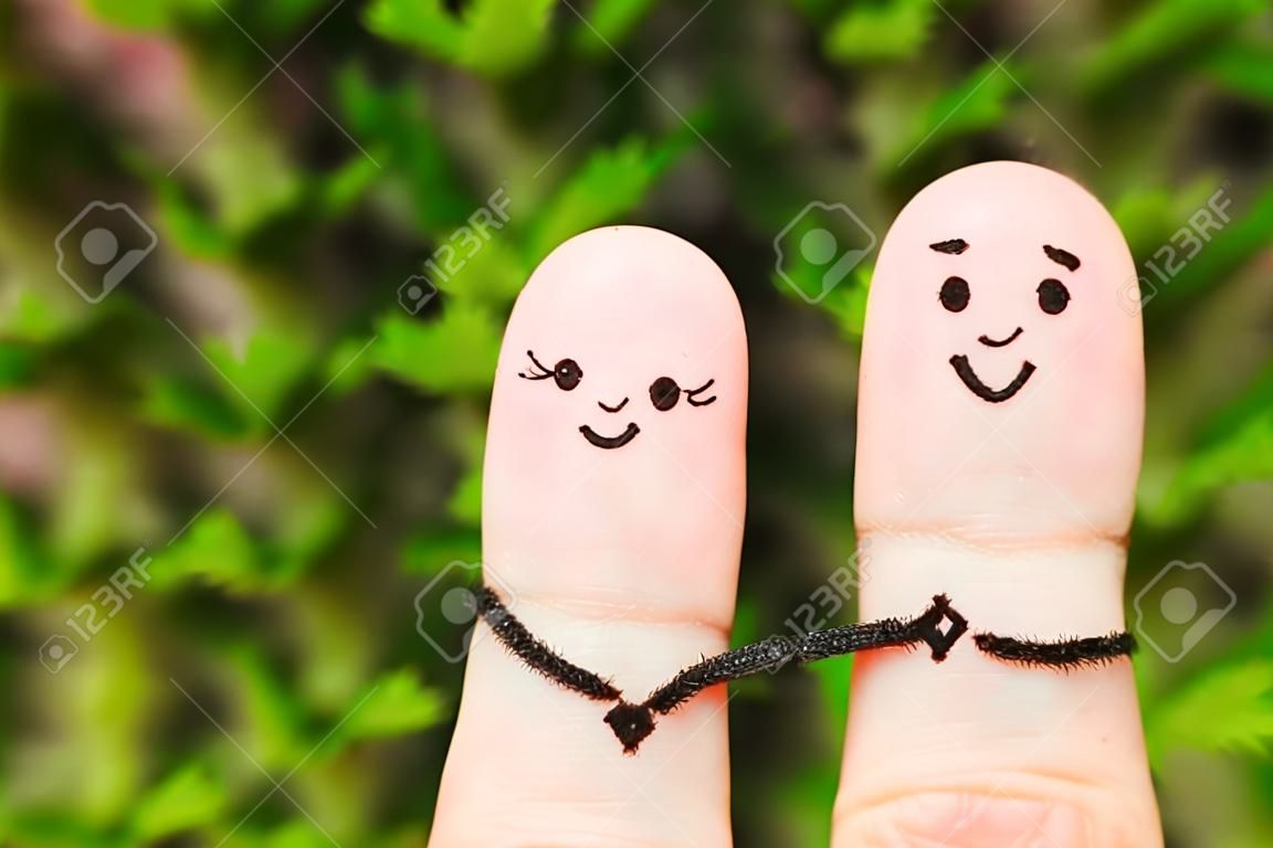 Палец искусство Счастливая пара. Счастливая пара, держась за руки.