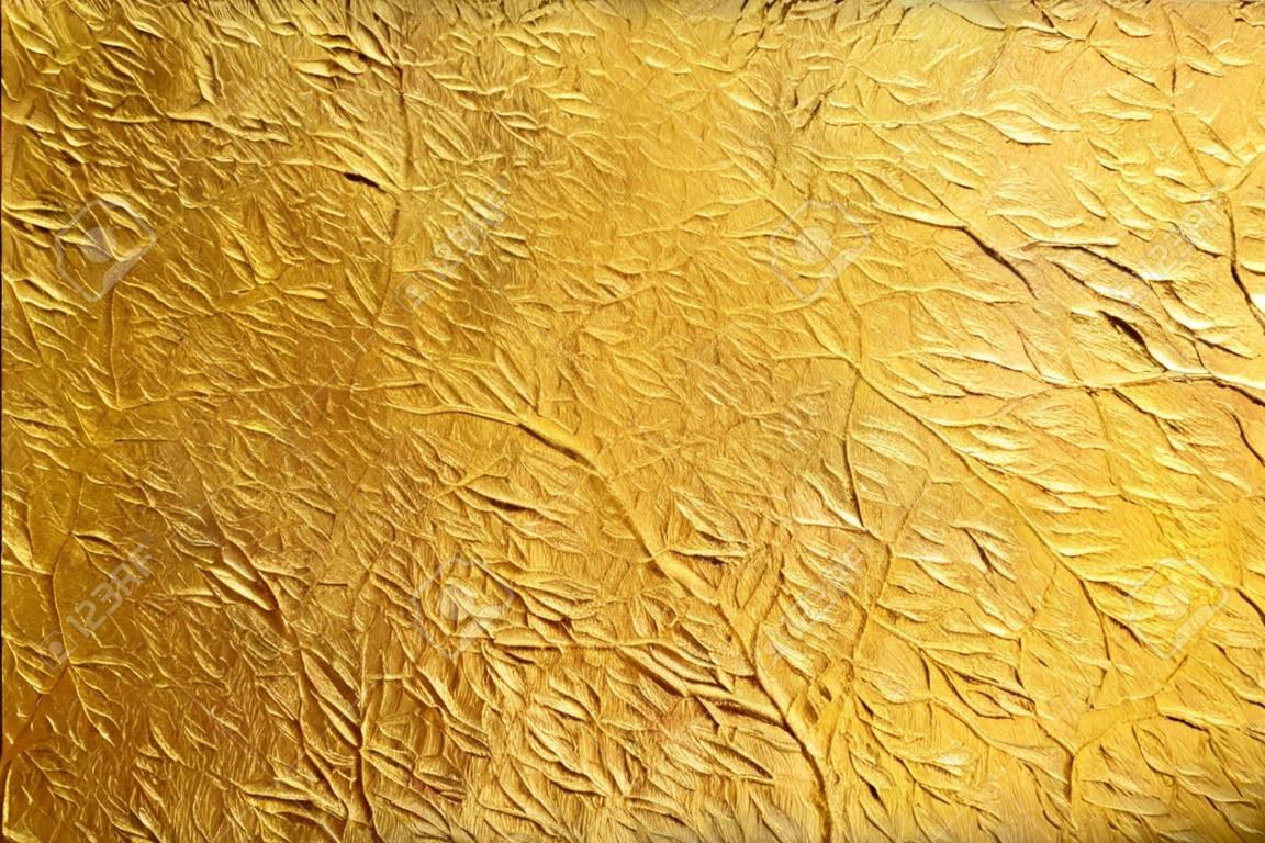 glanzend geel blad goudfolie textuur achtergrond