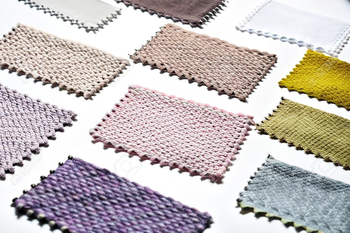 Catalog of multicolored cloth from matting fabric texture background, silk fabric texture, textile industry background.