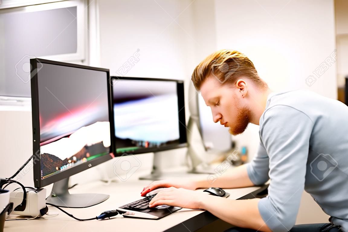 Programmer working in a software developing company office