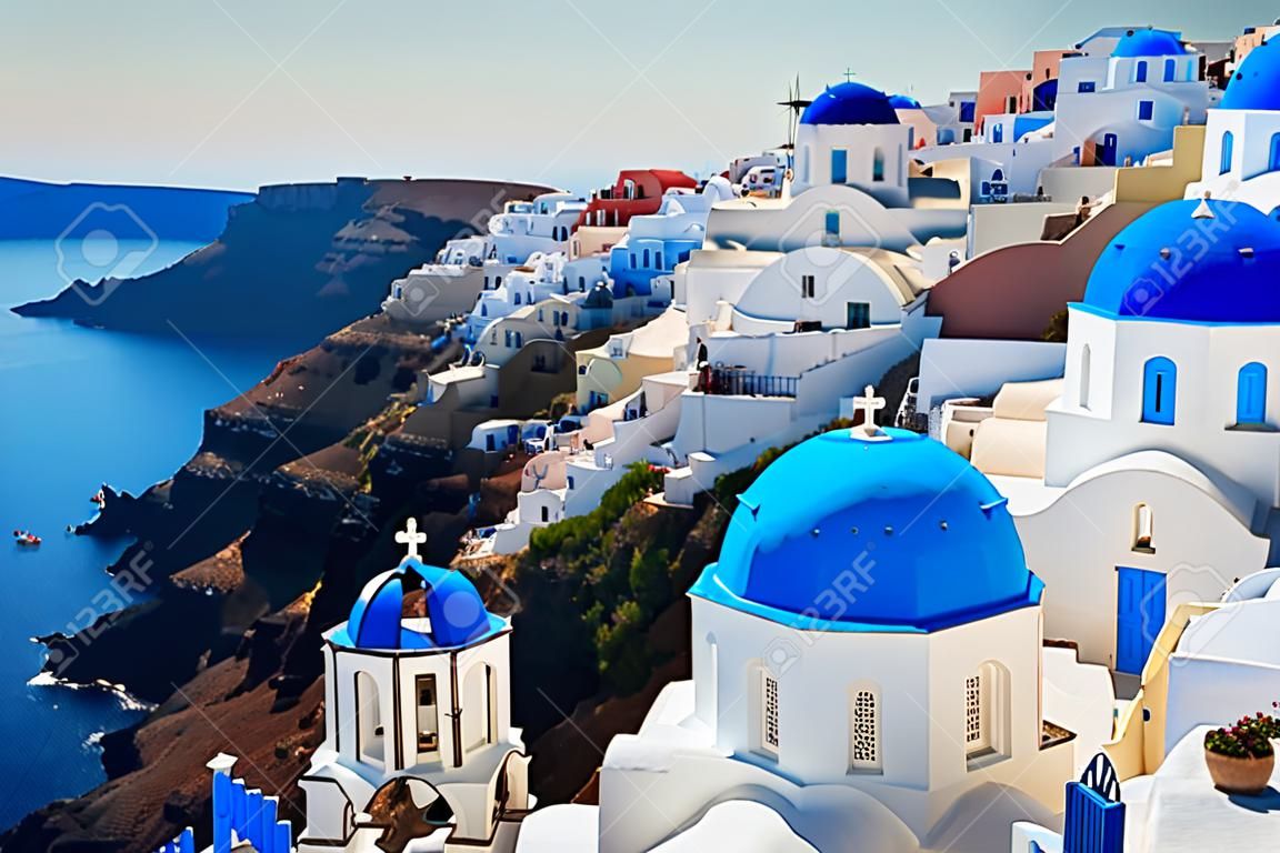 Oia, traditional greek village of Santorini with blue domes of churches, Greece