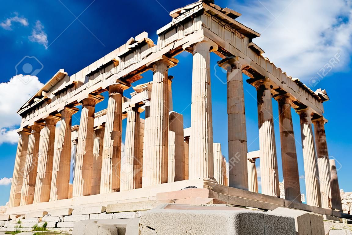 Parthenon temple over bright blue sky