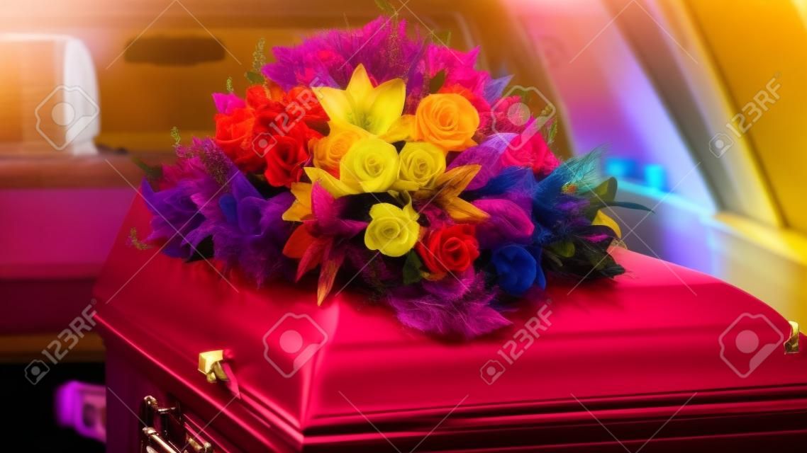 closeup shot of a colorful casket in a hearse or chapel before funeral