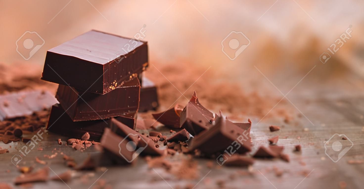 Dark chocolate on wooden table