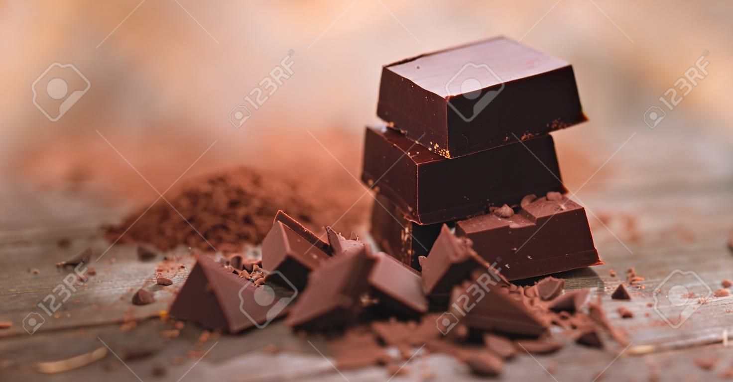Dark chocolate on wooden table
