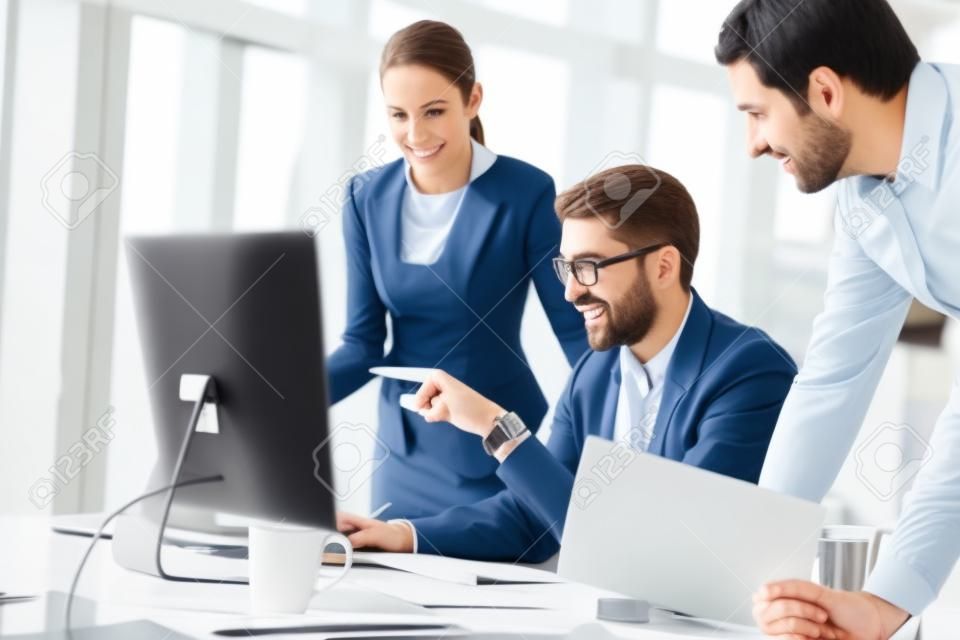 Business people working and discussing in modern office