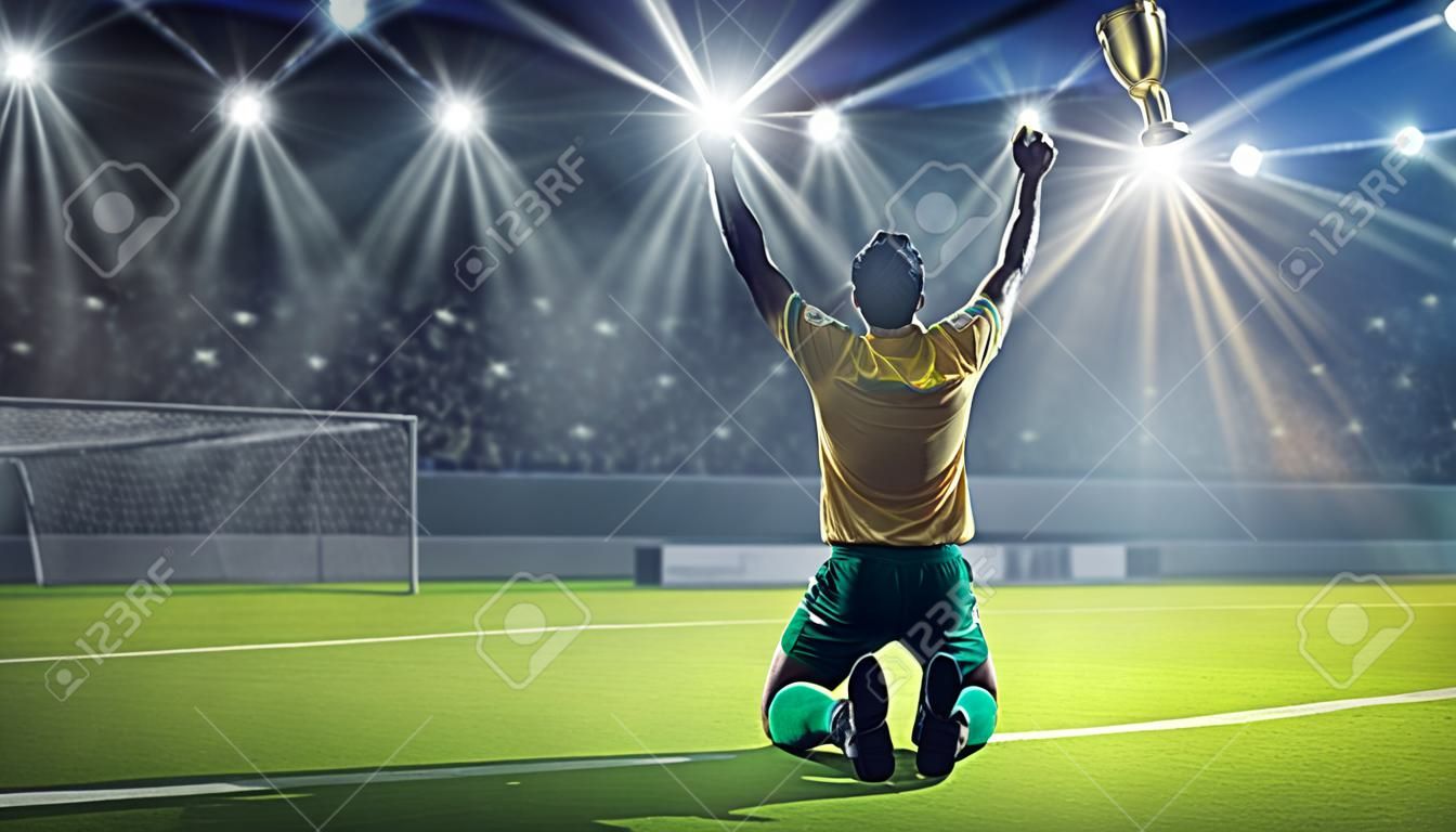 Fußball-Spieler feiern den Sieg beim Sieg Tasse halten
