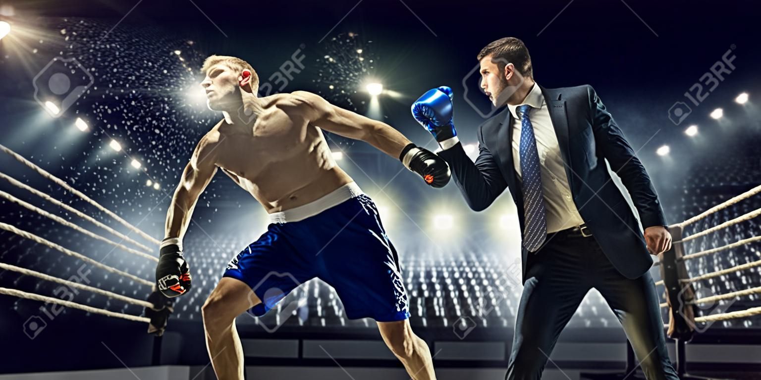 Businessman in suit fighting opponent at ring