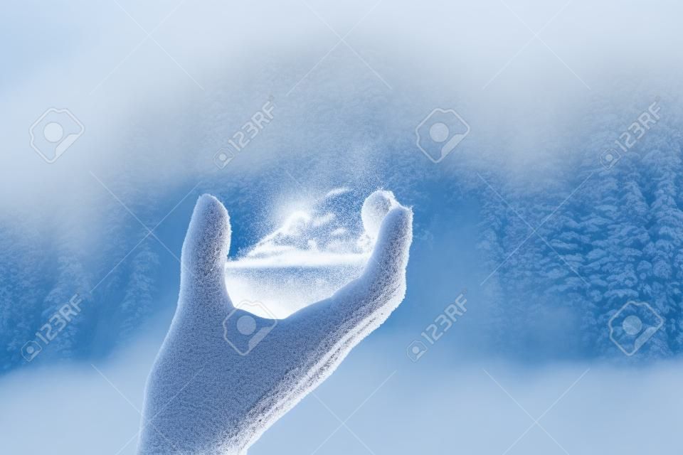 Mountain with snow top in hands