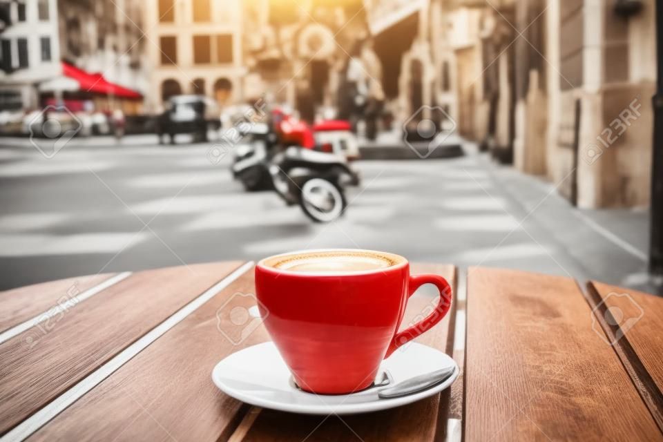 street cafe in Europe, cup of coffee on cozy vintage cafe terrace