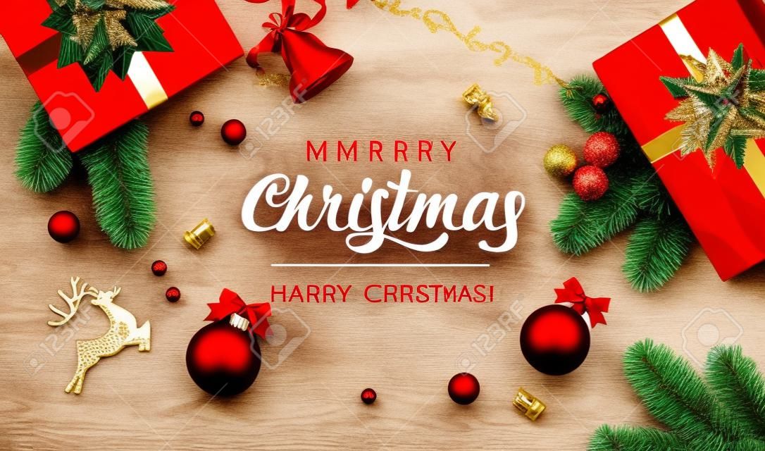 Merry Christmas Red Background with gifts box, green fir tree pine branch, red Christmas ball, golden deer, jingle bell and holly berry. Horizontal Christmas posters, greeting cards, website. Vector