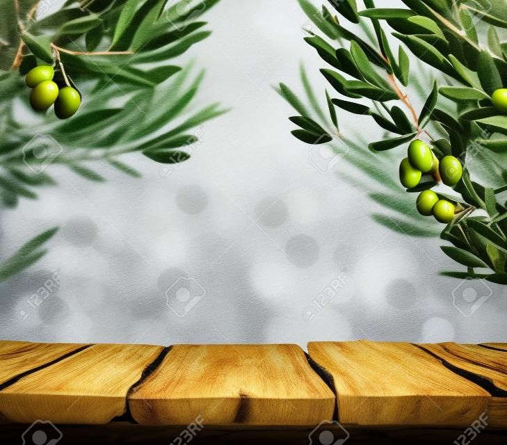 Olives background. Olives on olive tree with bokeh. food background