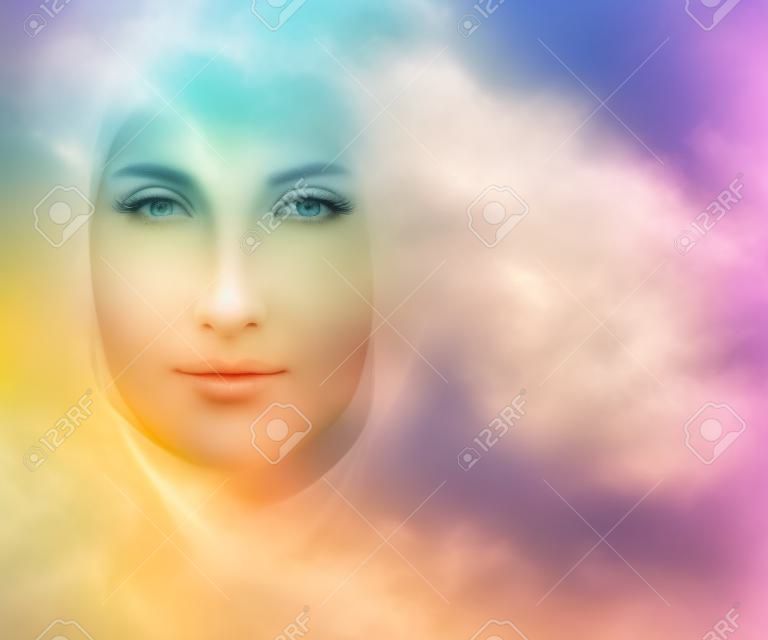Gentle Spirit - ethereal golden light forming the face of a gentle spirit on a pastel colored energy field background with copy space on right