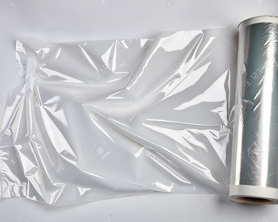 grand rouleau de film transparent blanc enroulé pour emballer les aliments, vue de dessus