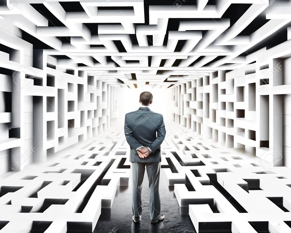 Businessman standing in labyrinth, facing difficulties in business and the stress of daily life