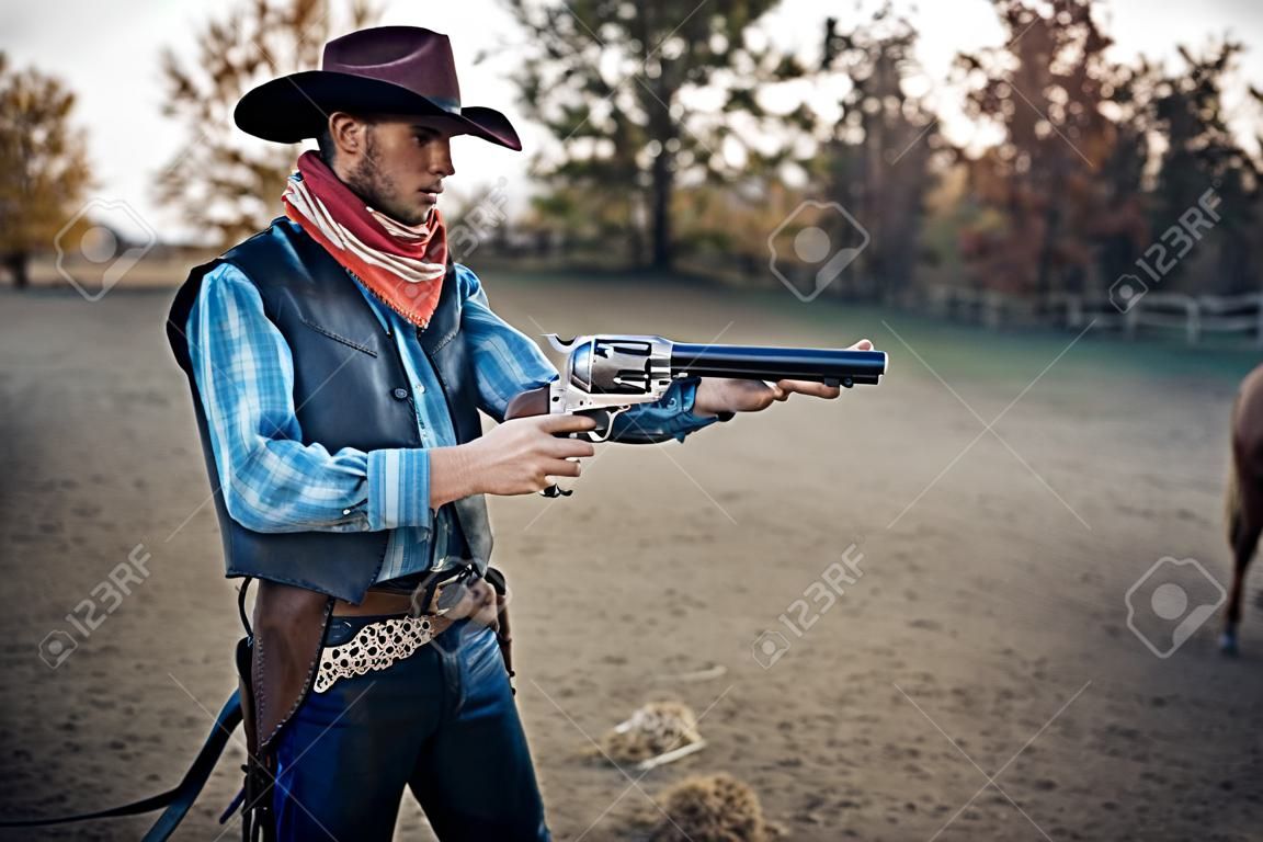 Cowboy with revolver, gunfight on ranch, western