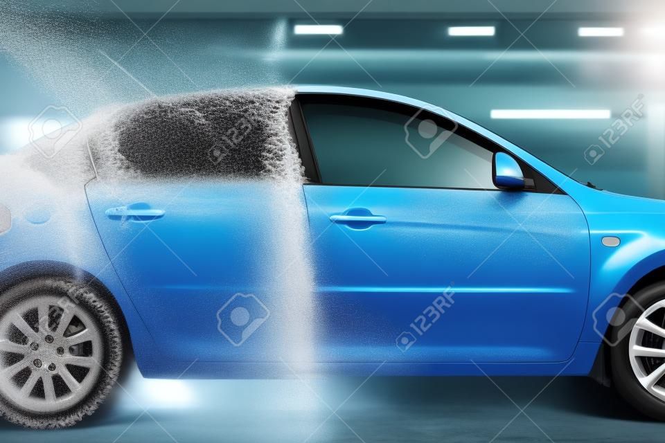 Automobile is half in foam, car wash service, nobody. Automobile on carwash station, car-wash business concept