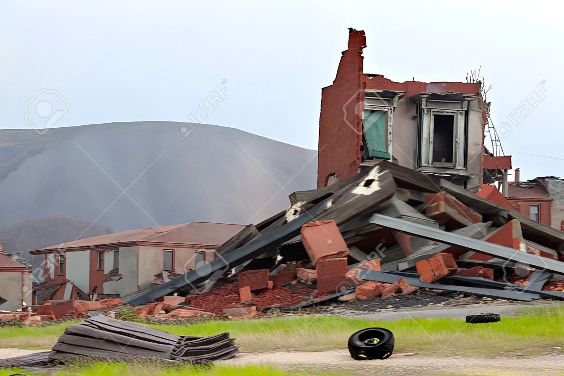 Completely destroyed a two-story brick building