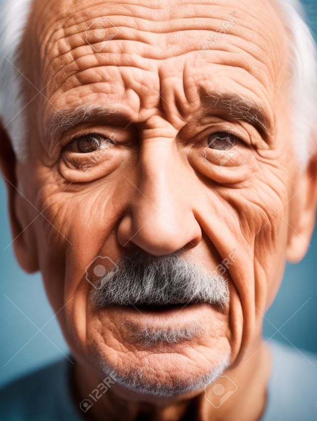 Portrait of an elderly man with wrinkles on his face. Toned.
