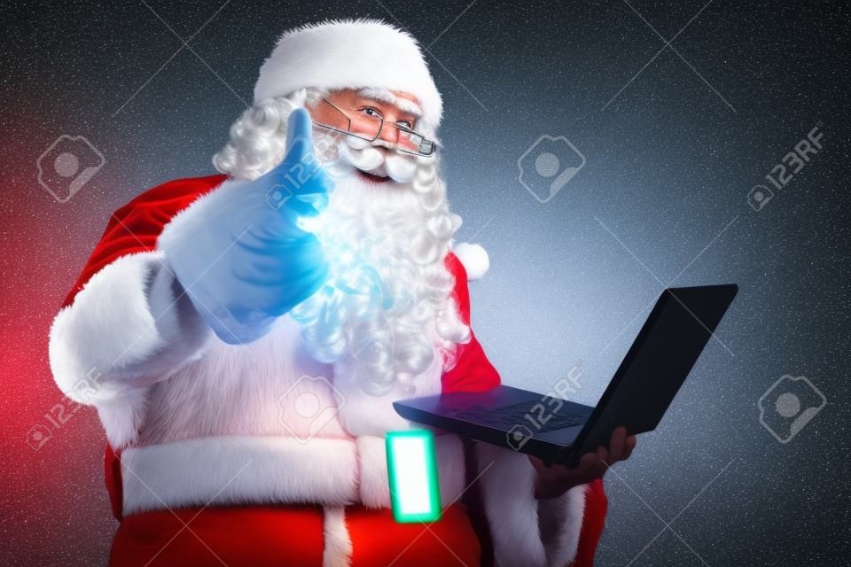 Kerstman met moderne technologie