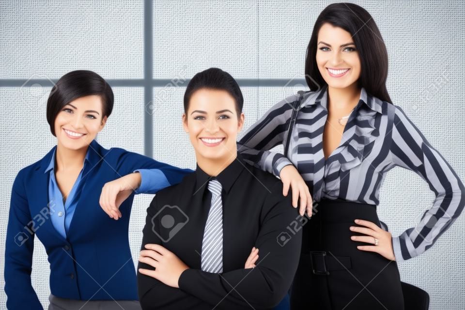 Happy smart businesspeople portrait, team posing together, smiling, looking at camera.�