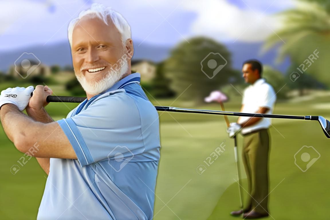 Closeup portrait of mature male golfer holding golf club, smiling happy, looking at camera.�