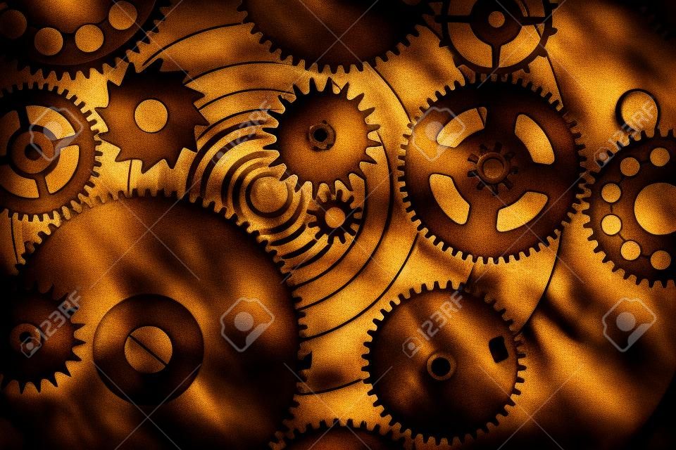 Steampunk background from mechanical clocks details over old metal background. Inside the clock, gears