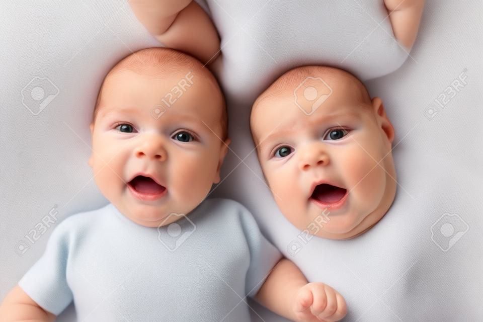 Adorable twins babies boys  Top view of children 