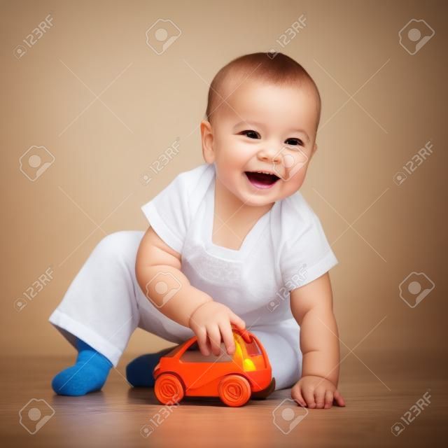 smiling kid playing with toy