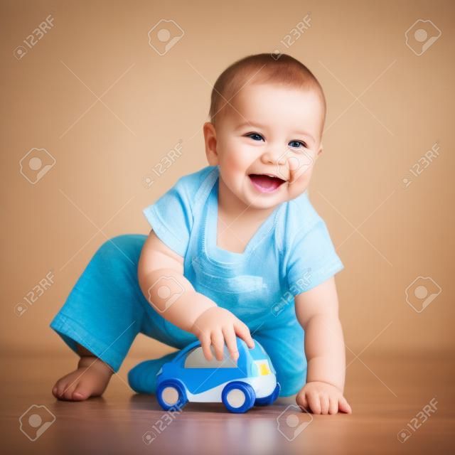 smiling kid playing with toy