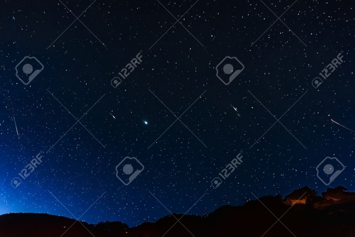 Many starts on blue dark night sky as a cosmos background.