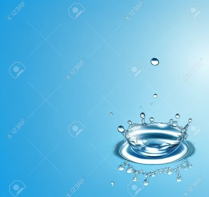 Water drops splashing a clear blue background with reflexion and room for your text.