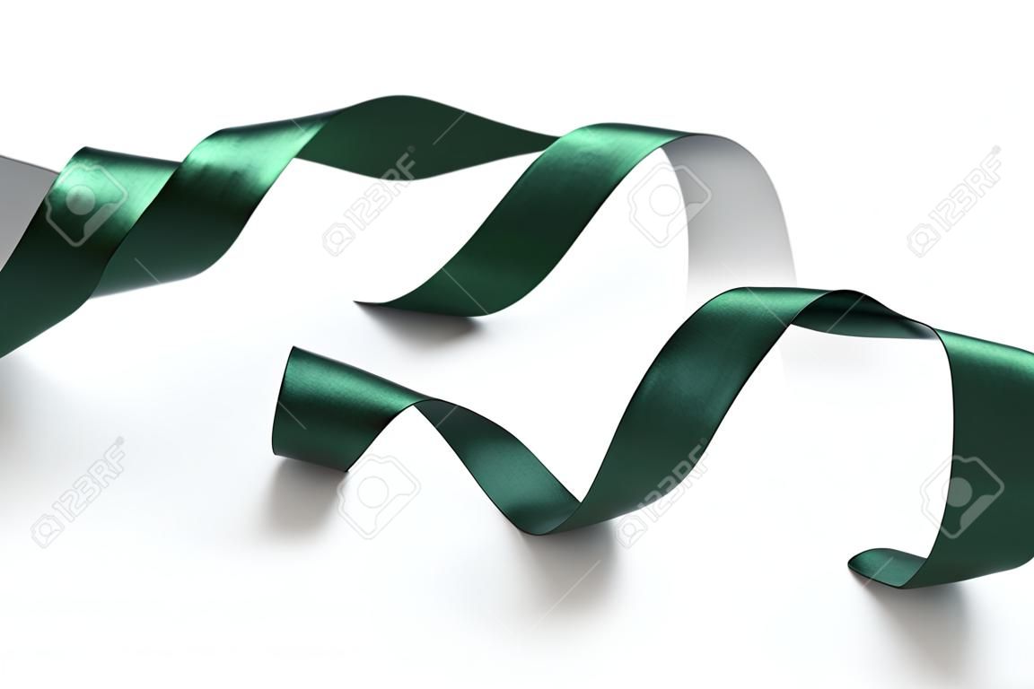 Un rouleau de ruban vert isolé sur fond blanc
