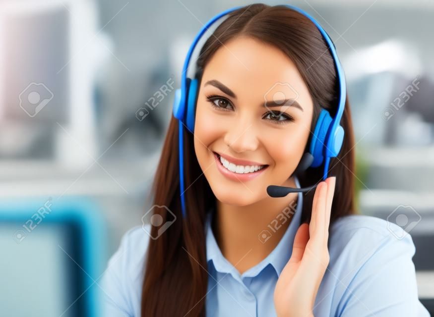Female customer support operator with headset and smiling 