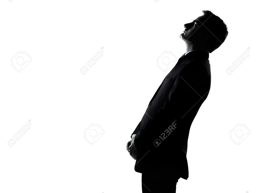 silhouette caucasian business man   profile serious looking up expressing behavior full length on studio isolated white background