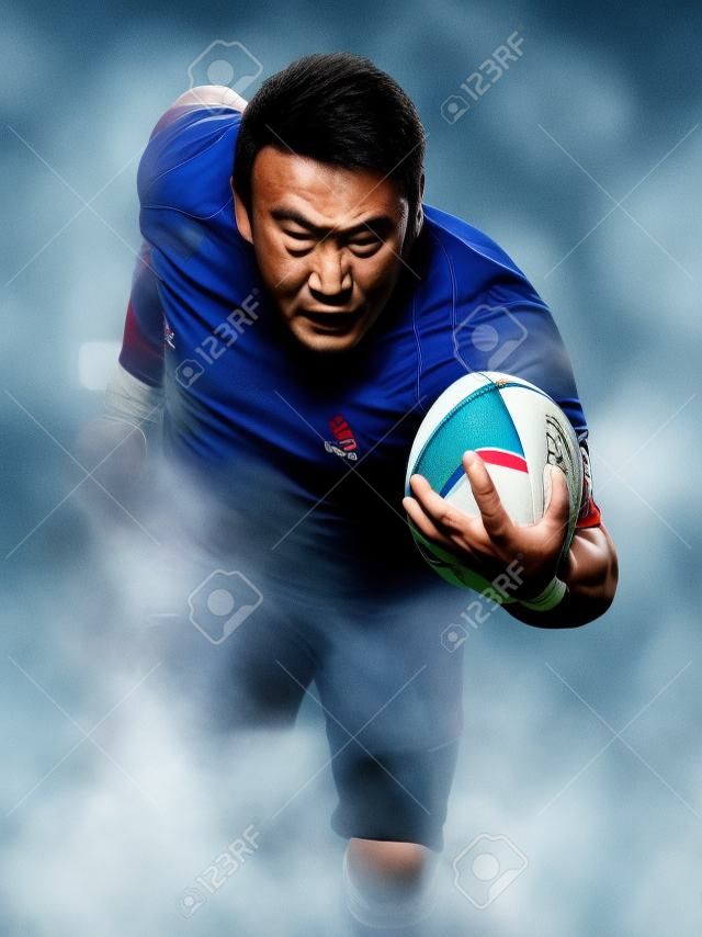 one causcasian man rugby player isolated on back background