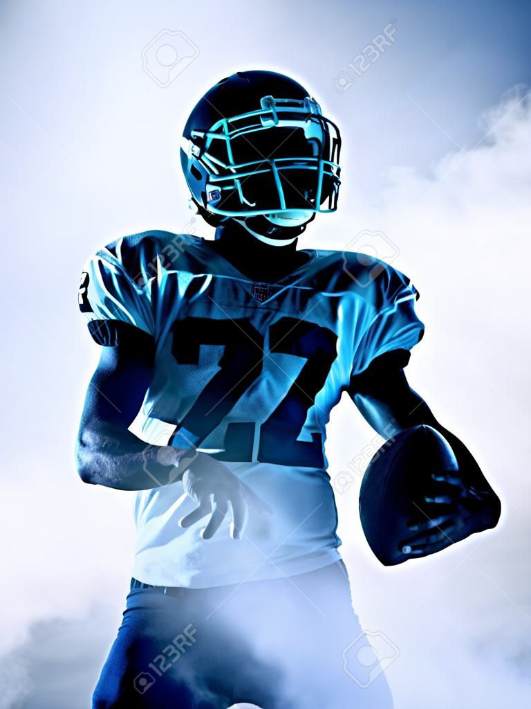 one american football player portrait in silhouette shadow on white background