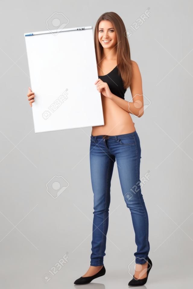 Полная длина красивых женщин, показывая пустой доске