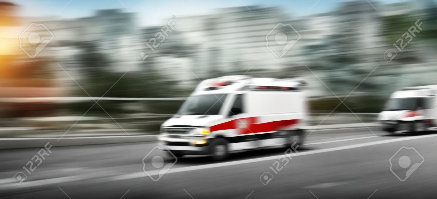 Ambulance On Emergency Call In Motion Blur. Ambulance In The City On A  Blurred Background Фотография, картинки, изображения и сток-фотография без  роялти. Image 133249161