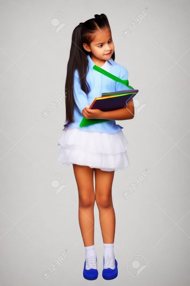 una bambina è in una forma scuola che ha avuto un'idea, isolato su uno sfondo bianco