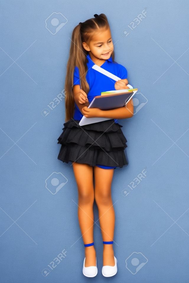 a little girl is in a school form which had an idea, isolated on a white background