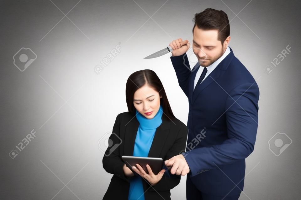 portrait businessman holding knife and businesswoman holding tablet isolated on white background (comparing betrayal concept)
