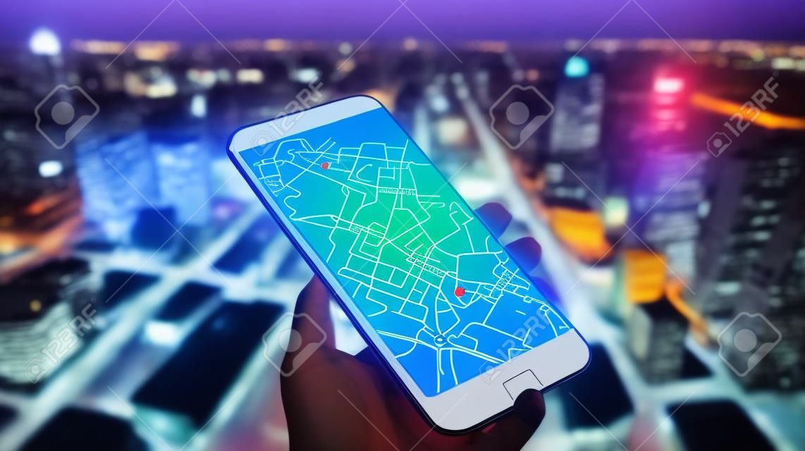 Mobile phone online map with big city lights on background. Gps map navigation with smartphone app. Location mark and automobile sign. emote data monitoring. Autonomous online car