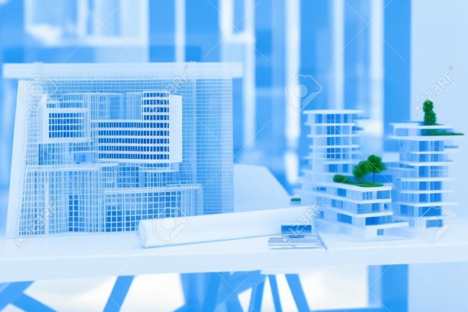Architecture, blueprints and model building design in empty architectural company office. Vision engineering, real estate or residential planning with 3D structure for luxury apartment infrastructure