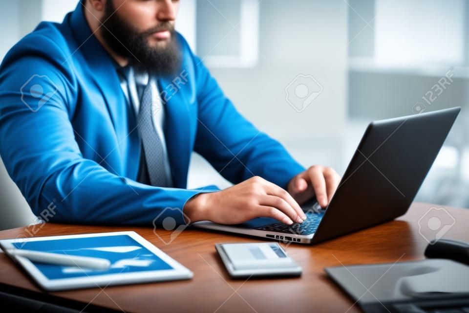 Businessman, tattoo and digital marketing laptop with startup company finance, budget or office paper data. Ceo hands, leadership or thinking manager working on technology with brand growth documents