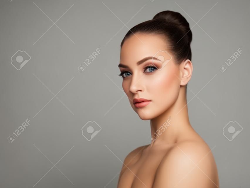 She has a serious look about her. Studio portrait of an attractive young woman posing against a white background.